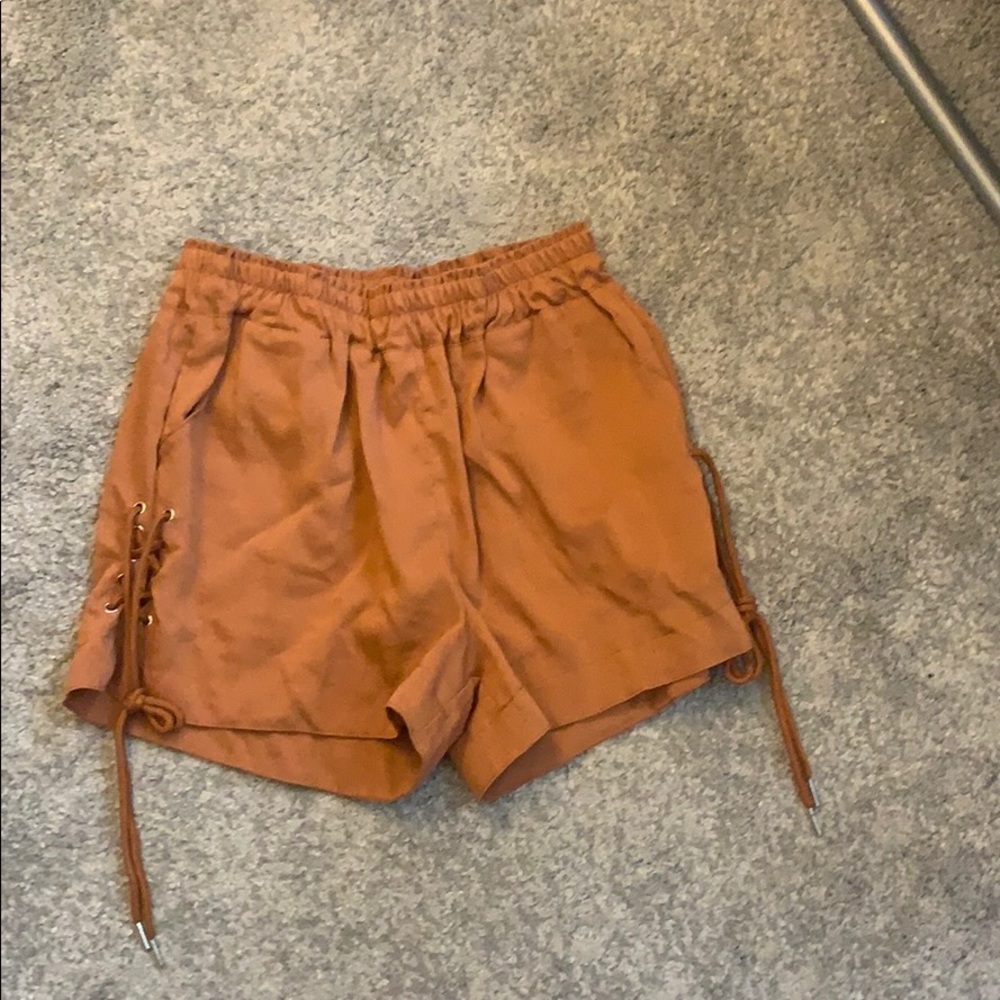 Tan shorts with tied side